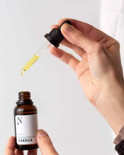 Hårolie i glasflaske