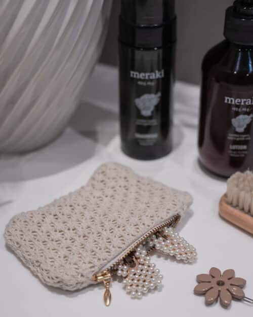 Strikket pung i beige melange